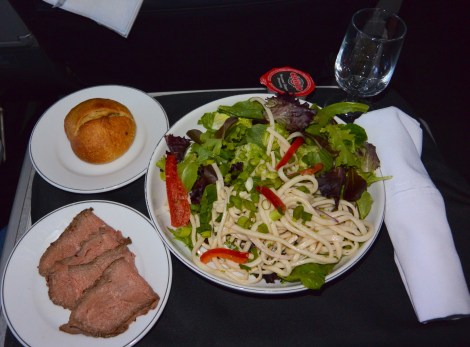 Chilled beef with udon noodle salad aboard American Airlines.