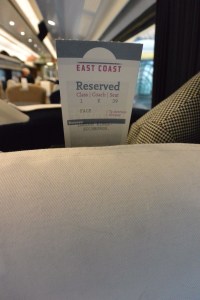Card marking reserved seat on East Coast Line train to Edinburgh, Scotland.