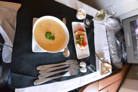 Corn chowder and Thai chicken appetizer aboard American Airlines Flight 56.