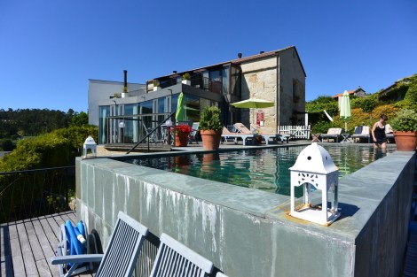 Swimming pool and main building at Quinta de San Amaro, Meaño, Spain.