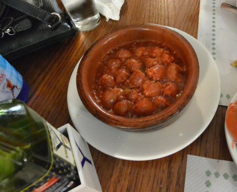 Sausages cooked in wine at Cerveceria Rua Bella, Santiago de Compostela, Spain.