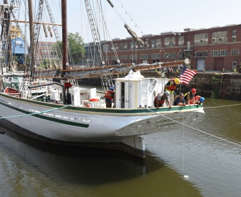 Crew checks the position of Gazel's stern while as the graving dock is emptied.